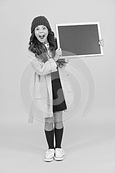 Join kids club. School entertainment and activities. Smiling girl wear winter outfit blank chalkboard copy space. Fresh