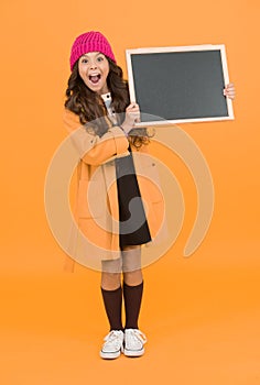 Join kids club. School entertainment and activities. Smiling girl wear winter outfit blank chalkboard copy space. Fresh