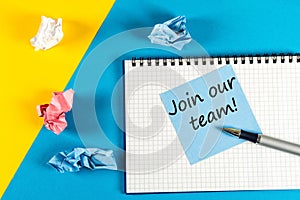 Join Our Team - note at workplace. Hiring and job offer concept