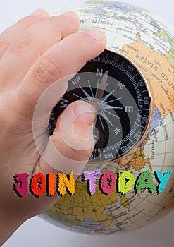 Join Today wording written on blank torn paper on globe