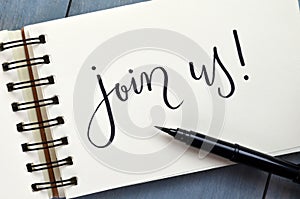 JOIN US hand-lettered in notepad