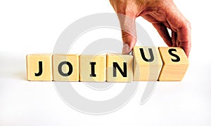 Join us symbol. Businessman turns wooden cubes and changes concept words Join to Join us. Beautiful white background. Business