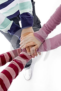 Joined hands of friends