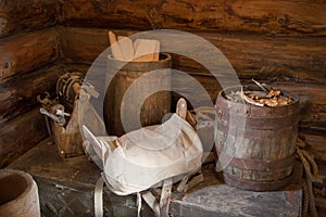 Joinery tools, barrel and saddle on the chest in the old barn