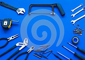 Joinery tools on blue background. Place for the text. A concept for Father`s Day. Top view.
