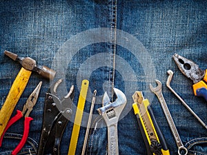 Joinery tools on a jean texture background. Labor day concept.