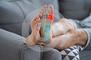 Joint diseases, hallux valgus, plantar fasciitis, man`s leg hurts, pain in the foot