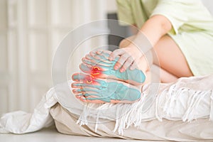 Joint diseases, hallux valgus, plantar fasciitis, woman`s leg hurts, pain in the foot, massage of female feet at home