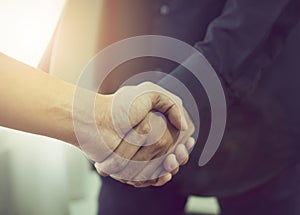 Joint Hands of Two Businessmen After Negotiating a Successful Business Agreement.