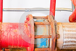 Joint pipe system Old big plumbing red which has dust dirty inside of building industrial