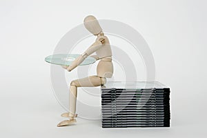 Jointed doll with cd stack