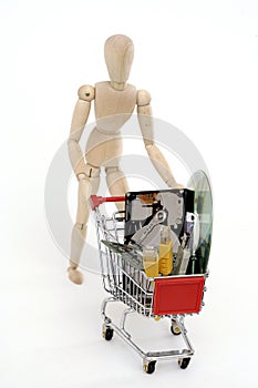 Jointed doll with shopping cart photo