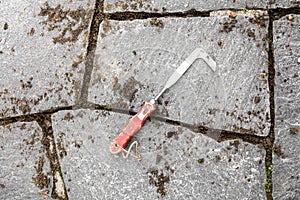 Joints beeing cleaned with a crack weeder