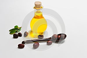 Jojoba oil on white background