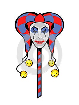 Joker mask on a stick photo