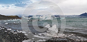 Jokulsarlon glacial lake, lagoon with ice blocks, Iceland. Situated near the edge of the Atlantic Ocean at the head of the