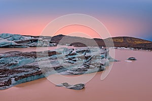 Jokulsarlon, glacier and lake at Iceland at sunset