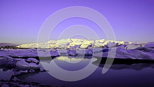Jokulsarlon glacier lake in ultraviolet at sunrise