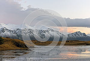 Jokulsarlon ice lake with snow covered mountain in Hofn, Iceland