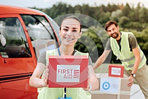 Jolly two volunteers assuring aid