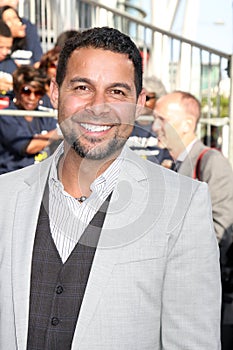 Jon Huertas arrives at the