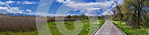 Jordan River Parkway Trail, Redwood Trailhead bordering the Legacy Parkway Trail, panorama views with surrounding trees and silt f