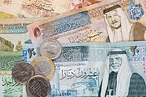 Jordanian dinar banknotes and coins photo
