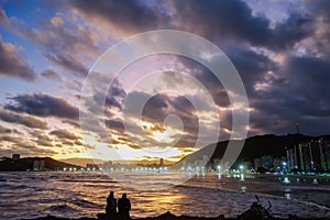 Jose menino beach in Santos city, Sao Paulo, Brazil, at dusk. beachfront buidings photo