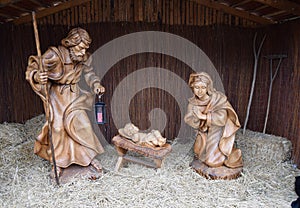 Joseph and Mary with baby Jesus statues at Christmas market