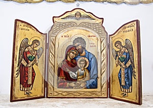 Joseph, Mary and child with Archangels on altar in small church at Masseria Il Frantoio, Southern Italy