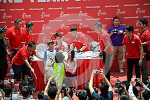 Joseph Schooling, the Singapore's first Olympic gold medalist, signing autographs at Raffles City, as part of his victory par