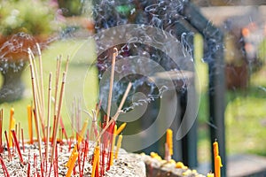 Joss stick are burning and smoke