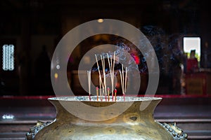 Joss stick or incense sticks burning in temple