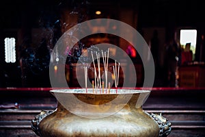 Joss stick or incense sticks burning in temple