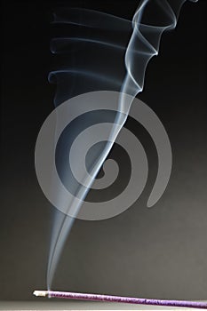 Joss stick and white smoke