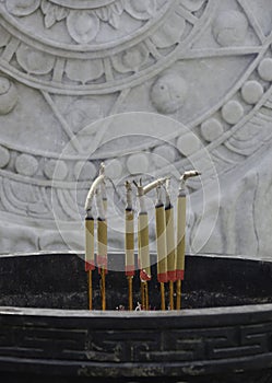 Joss sticks in front of temple
