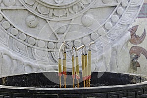 Joss sticks in front of temple