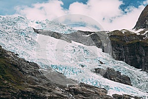 Jostedalsbreen National Park, Norway. Close Up View Of Melting Ice And Snow, Small Waterfall On Boyabreen Glacier In