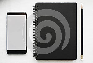 Journal book and pencil smartphone