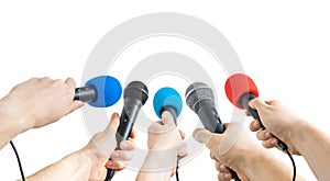 Journalism and conference concept. Many reporter hands hold microphones. photo