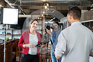 Journalist Interviewing Business Man In Conference Room For Broadcast