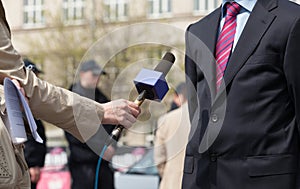 Journalist making media interview