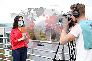 Journalist with medical mask presenting news during coronavirus. World map demonstrating spread of disease