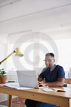 Journalist, typing or black man with laptop for research working on online business or copywriting. Computer, digital