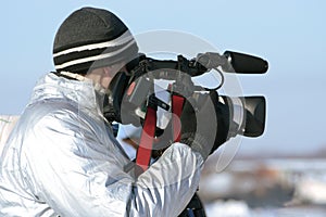 Journalist with a videocamera