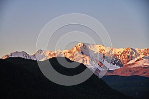 Journey through Altai mountains to Aktru. Hiking to snowy peaks of Altai mountains. Survival in harsh conditions, beautiful nature