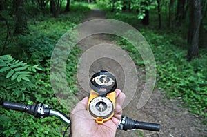 Journey by bike with a compass.