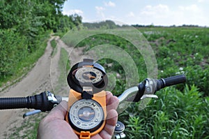 Journey by bike with a compass.