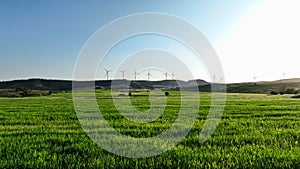 Journey to a Greener Future: Majestic Aerial View of Windmills Powering