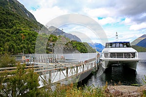 Journeys boat waiting for her passengers in Te Anau lake, New Zealand